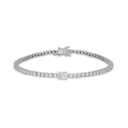 Classic Tennis Bracelet with Single Oval Cut Diamond | White Gold
