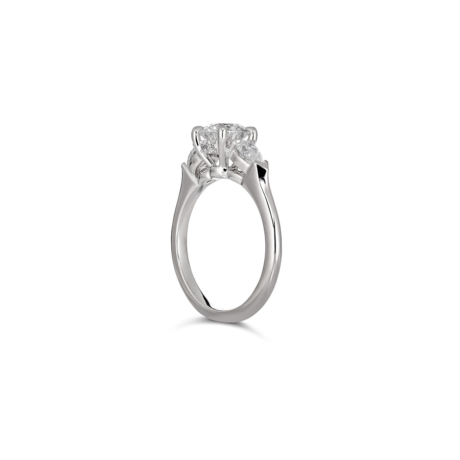 Classic Three Stone Round Brilliant Cut Engagement Ring with Pear Diamonds | Platinum