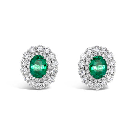 Regal Collection® Emerald and Diamond Halo Earrings Oval | White Gold
